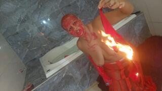 Bald woman puts her bra on fire