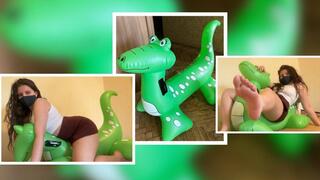 Mistress Mersiiik crushes another inflatable dragon, steps on it with her bare feet, jumps on it, sits on it, rubs it with all her weight. Legs, beautiful, ass, fetish, inflatable