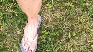 Tempest showing in grey flip flop