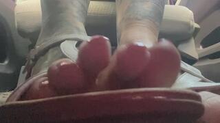 Toes in white sandals