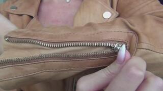 I zip and unzip my favorite red leather jacket a