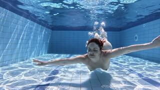 underwater swimming in pool
