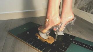 Giantess goddess WinnieLouxo first toy car crush of a Chevrolet Corvette C3 in big stripper heels with painted toenails Left close view