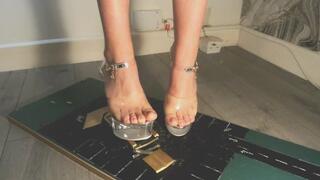 Giantess goddess WinnieLouxo Crushes a Ford Falcon Convertible in big stripper heels with painted toenails right close view