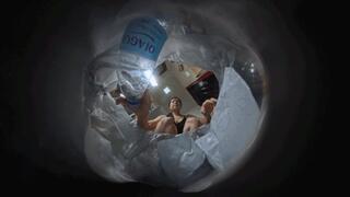 VR360's perspective of putting things into garbage bags