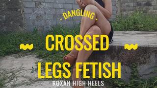 Rich and big legs crossed with high heels dangling (3)