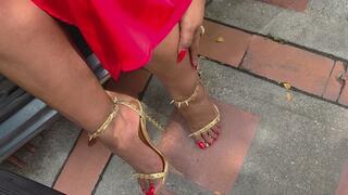 Balbina trying to start the chevrolet corsa while wearing gold saralissima heels
