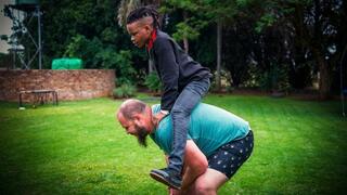 Big Guy Uses Smaller Man as Human Weight – Lifting and Carrying