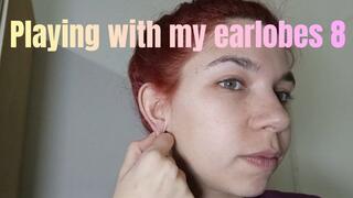 Playing with my earlobes 8