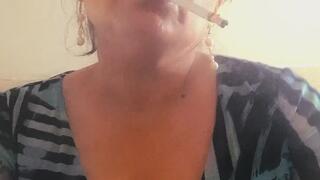 Smoking a Cigarette in a Blue Dress |