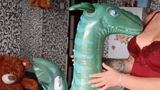 girl blow long balloons