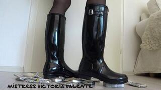 Rubber boots crush cigarette packs and boots squeak