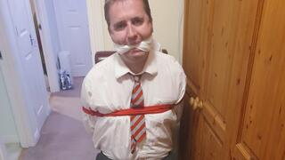Man kept bound and gagged in adult school uniform in room 2-BBW domination,BBW bondage,male bondage,man in bondage,amateur,school uniform,schoolboy,gay bondage,argyle socks,rope bondage,man tied up,bound and gagged man,plimsolls,feet,