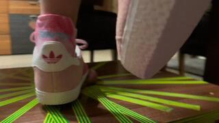 Full weight ball and cock standing with pink adidas gazelle