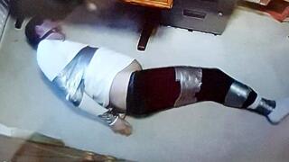 Watching a duct taped man struggling in my isolation room -BBW domination,BBW bondage,amateur,male bondage,man in bondage,duct tape,duct taped,taped up,man tied up,bound and gagged man,leggings,socks,gay bondage,tape bondage,