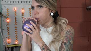 Angel Warms Up Her Cheeks By Blowing Balloons (MP4 - 720p)