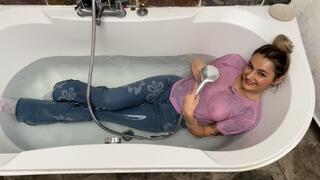 Sammi Perri gets wet in the shower wearing her new Hollister jeans and pink satin panties - By All Soaked