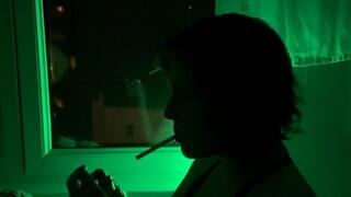 Late night cravings - Silhouette of a hungry smoker