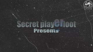 A girl drips wax on a bound boy