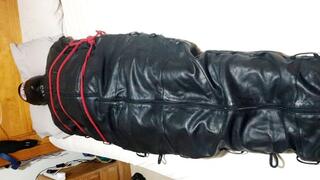 Edging a man in leather sleepsack-BBW domination,BBW bondage,handjob,edging,edged,amateur,Sam,leather sleepsack,male bondage,man in bondage,man tied up,cock ring,polishing,