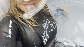 flirty in wetsuit and snorkel in hot tub