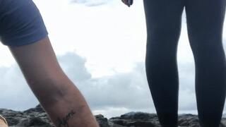 Hand trampling on sharp rocks