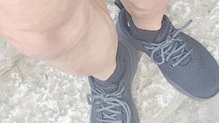 TRying out new black sneakers