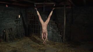A witch screams out loud orgasms when ropes and chains are pulled over her cunt