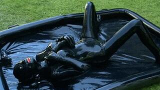 Messy latex encasement girl and the heavy rubber sploshing outdoor session - Part 1 of 2