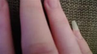 Scratching rough fabric with my long natural nails