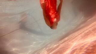 Carissa in the orange vintage gown underwater--no panties!