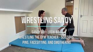 Sandy 08 - Wrestling the Gym Teacher - Scissors, Pins, Facesitting, and Smothering