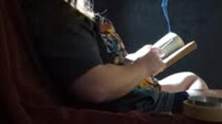 Reading a Book While Smoking a Virginia Slim Menthol 120