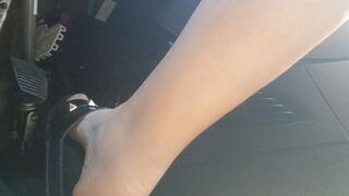 Driving in black sandals through the streets of Milan 4K