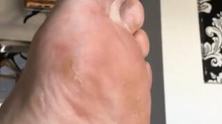 Bare feet slow and slightly dirty