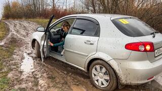 CAR STUCK Novice driver stuck in mud