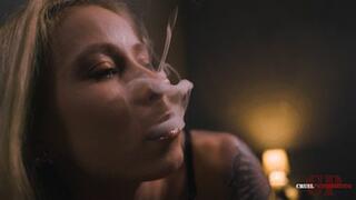 Her arms around a pillow, smoking 4K MP4