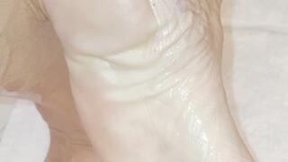 POV oiled legs and feet