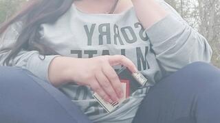 Nicki Pie smoking in the woods