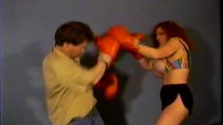 Big Tit Star Teddi Barrett Boxes Male Into Submission Then Breast Smothers Him