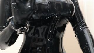 Fully Encased Silicone Doll in Rubber Plays with Silicone Pussy and Latex Sheath
