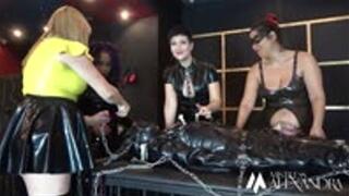 Triple coats of heavy rubber make you Our perfect bondage mummy by Mistress Alexandra, Mistress Ariana, Mistress Tess and Julietta