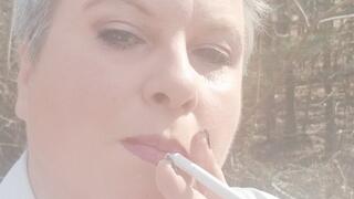 Mature Lady L outdoors smoking clip #1