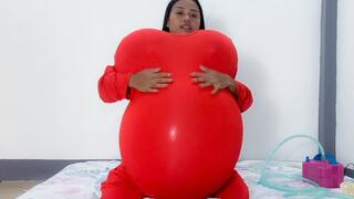 Sexy Camylle Stuffs Her Red Jumper With Baloon Boobs And Belly Then Pops Them