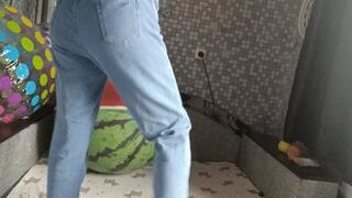 girl in jeans sittopop watermelon beachball