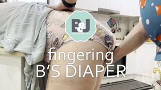 Fingering B's diaper