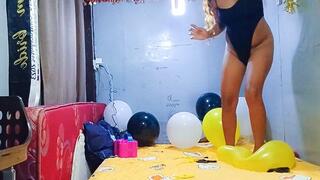 Sexy Juju Stomps To Pop Yellow Black And White Balloons