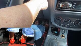 Joyce drives with her right foot barefoot with jewel