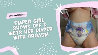 Diaper Girl Shows Off & Wets Diaper With Orgasm