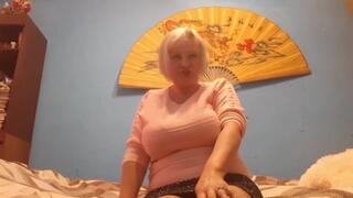 busty mature masturbating in the living room